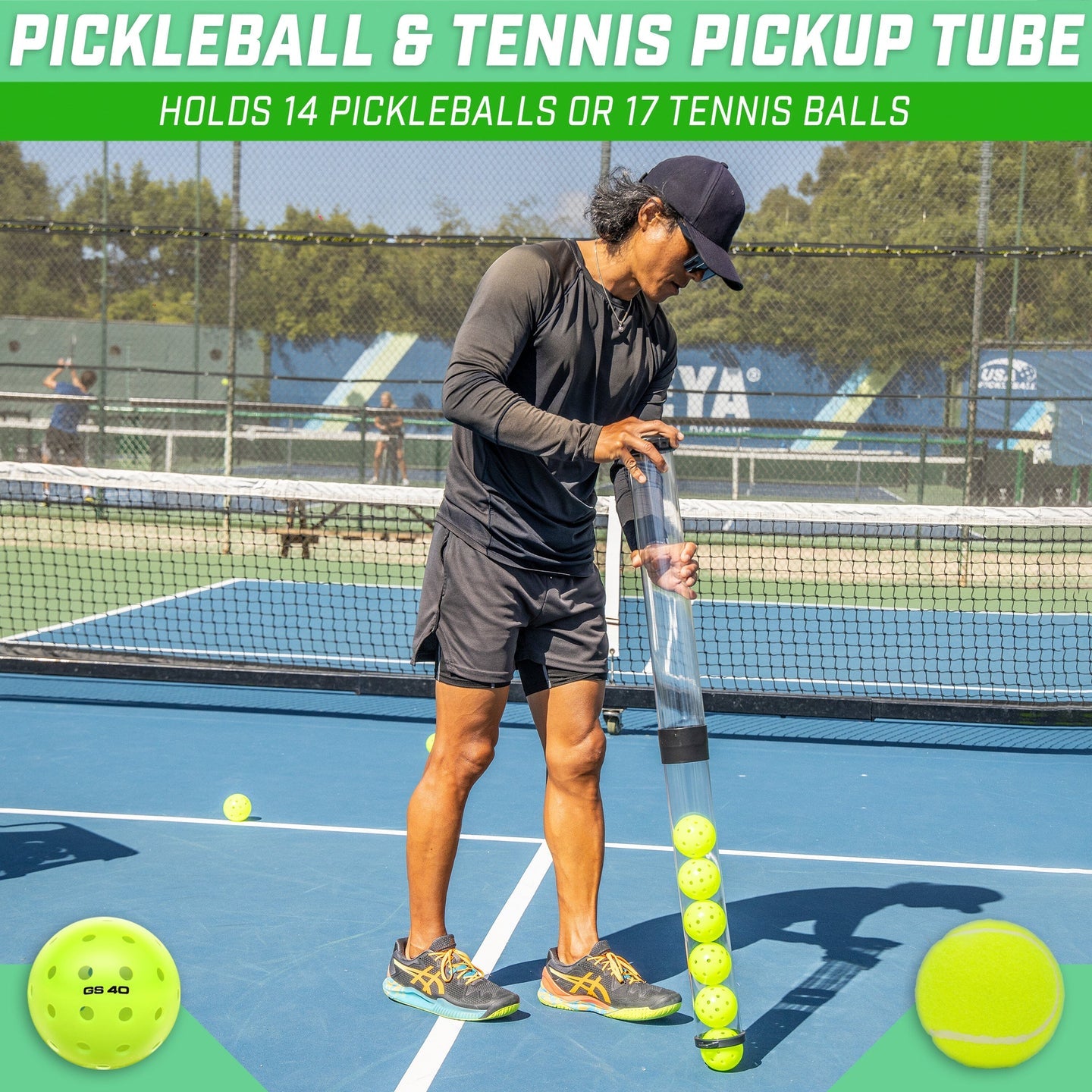 Man picking up pickleballs with pickleball picker upper tube
